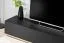 Parete attrezzata "Storli" 02, color rovere ribbeck / nero, 11 scomparti, 1 armadio, 1 scaffale, 1 mensola, 1 mobile TV, sistema "push to open", 240 x 40 x 127 cm