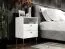 Comodino Almyros 01 bianco | Maniglie e gambe oro | 2 cassetti | 1 vano a giorno | 69,5 x 50 x 34 cm