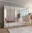 Armadio ad ante battenti | Colore: nero | Funzione soft-close | Maniglie: cachemire | 3 scomparti | 3 guide per abiti | Dimensioni: 300 x 52 x 202 cm | ABS | Armadio